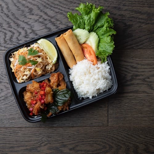 B-Bento 1, Spring roll, Garlic Chicken, Pad Thai.