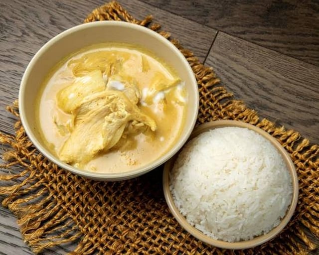 Cup of Yellow Curry Sauce.