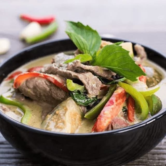 Cup of Green Curry Sauce.